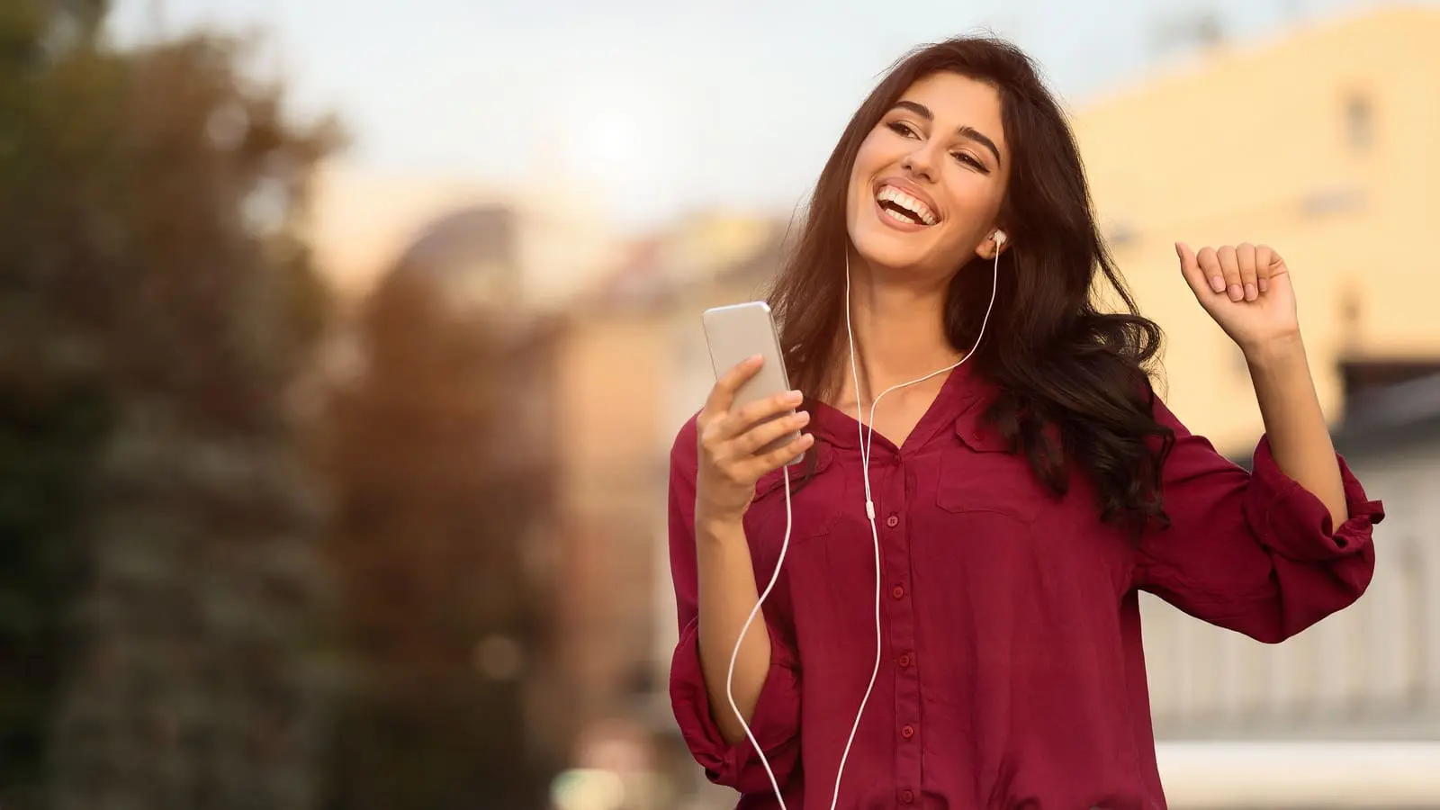 bigstock-Enjoy-Song-Woman-Dancing-And–304411579