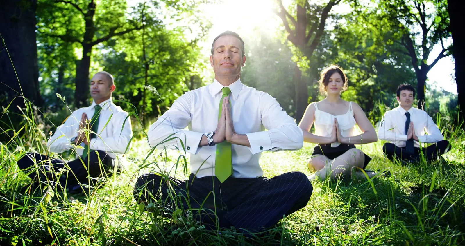 bigstock-Business-People-Meditating-Nat-215119849