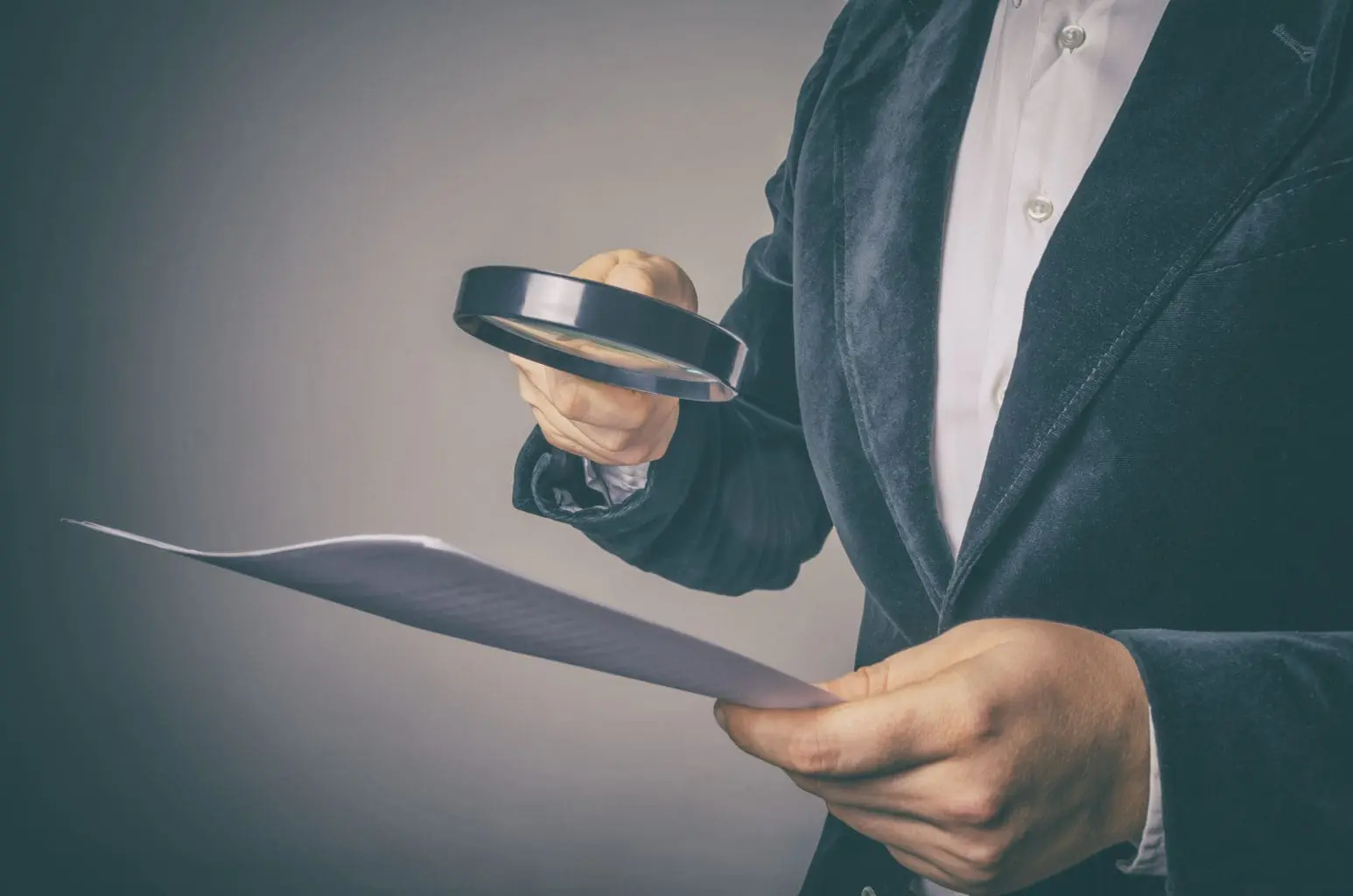 Corruption Audit Concept. The Inspector Uses A Magnifying Glass